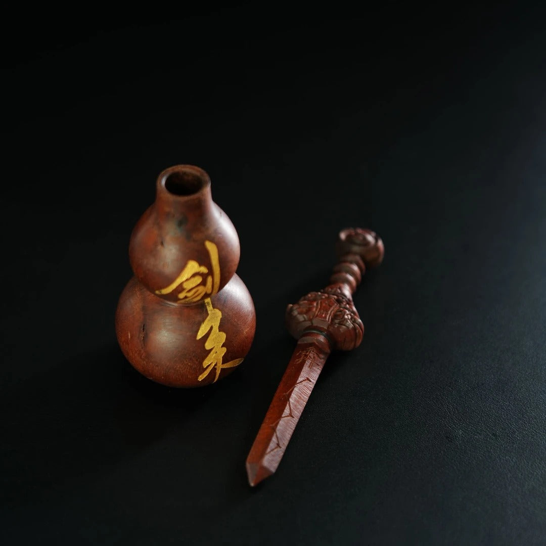 Lightning-Struck Wooden Gourd Cracked by Thunder, Hand-Painted with Gold-Inlaid Sword-Nurturing Design